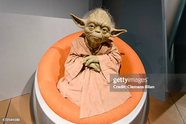 Wax figure of the Star Wars character Yoda is displayed on the occasion of Madame Tussauds Berlin Presents New Star Wars Wax Figures at Madame...