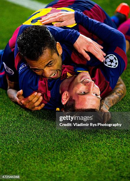 Lionel Messi of Barcelona celebrates with his team mate Daniel Alves after scoring his second goal during the first leg of UEFA Champions League...