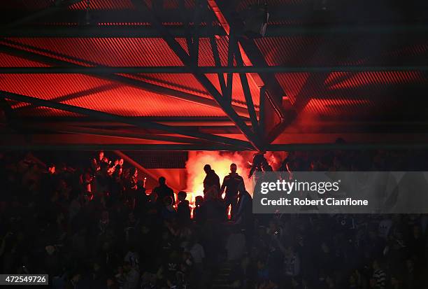 Victory fans celebrate after a goal was scored during the A-League semi final match between Melbourne Victory and Melbourne City at Etihad Stadium on...