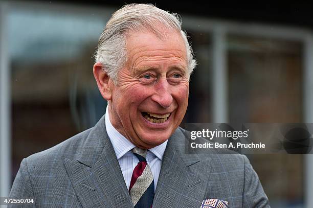 Prince Charles, Prince of Wales meets residents of The Guinness Partnership's 250th affordable home in Poundbury on May 8, 2015 in Dorchester, Dorset.