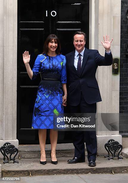 British Prime Minister David Cameron and his wife Samantha Cameron arrive at Downing Street on May 8, 2015 in London, England. After the United...