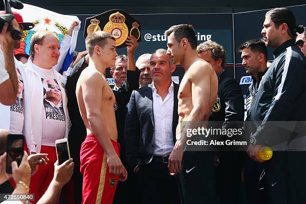 Fedor Chudinov of Russia and Felix Sturm of Germany pose with WBA vice president, Gilberto Jesus Mendoza, during their official weigh-in ahead of...