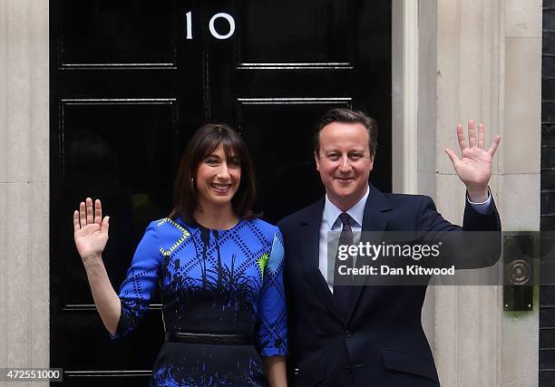 British Prime Minister David Cameron and his wife Samantha Cameron arrive at Downing Street on May 8, 2015 in London, England. After the United...