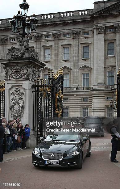 Prime Minister David Cameron's car leaves Buckingham Palace on May 8, 2015 in London, England. Mr Cameron met with Queen Elizabeth II to confirm his...