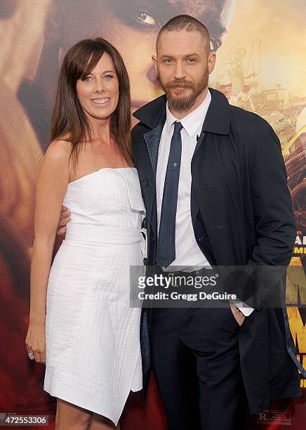 Actor Tom Hardy and Kelly Marcel arrive at the Los Angeles premiere of "Mad Max: Fury Road" at TCL Chinese Theatre IMAX on May 7, 2015 in Hollywood,...