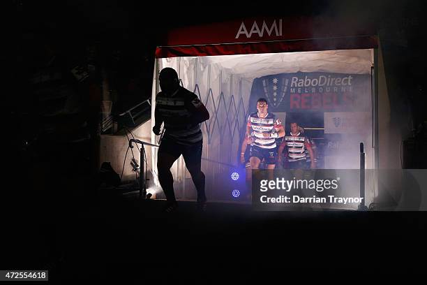 Rebels players run out before the round 13 Super Rugby match between the Rebels and the Blues at AAMI Park on May 8, 2015 in Melbourne, Australia.