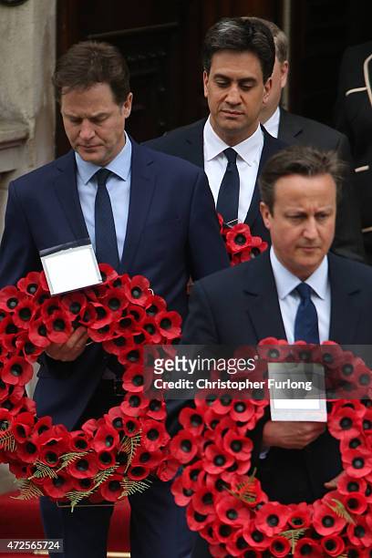 Labour Party leader Ed Miliband, Liberal Democrat leader Nick Clegg and Prime Minister David Cameron prepare to place a wreath during a tribute at...