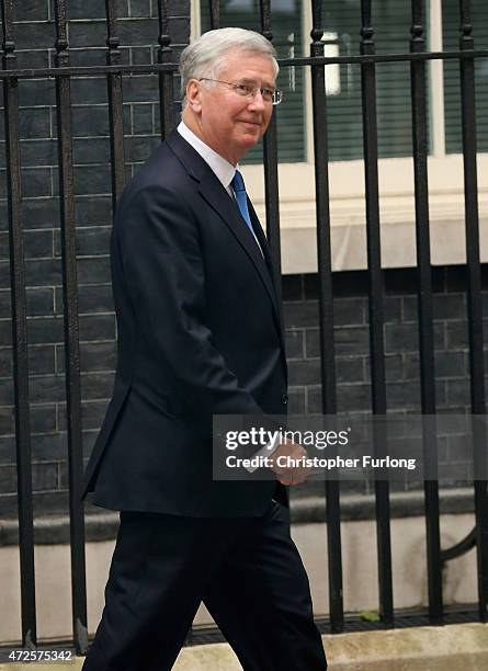 Defence Secretary Michael Fallon leaves Number 10 after his reappointment on May 8, 2015 in London, England. After the United Kingdom went to the...