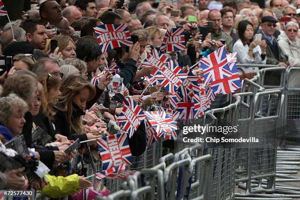 Members of the public gather during a tribute at the Cenotaph to begin three days of national commemorations to mark the 70th anniversary of VE Day...