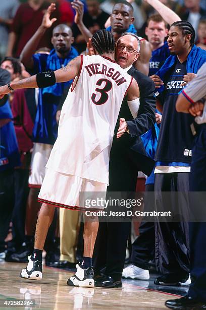 Allen Iverson of the Philadelphia 76ers hugs Larry Brown against the Toronto Raptors in Game two of the Eastern Conference Semifinals on May 9, 2001...
