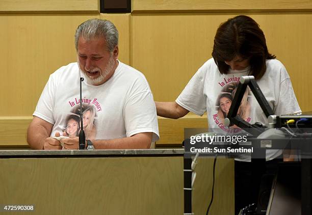 Gary Catronio cries as he speaks about his daughter, Marissa Catronio, as his wife, Natalie Catronio, comforts him Monday, May 4, 2015 in Fort...