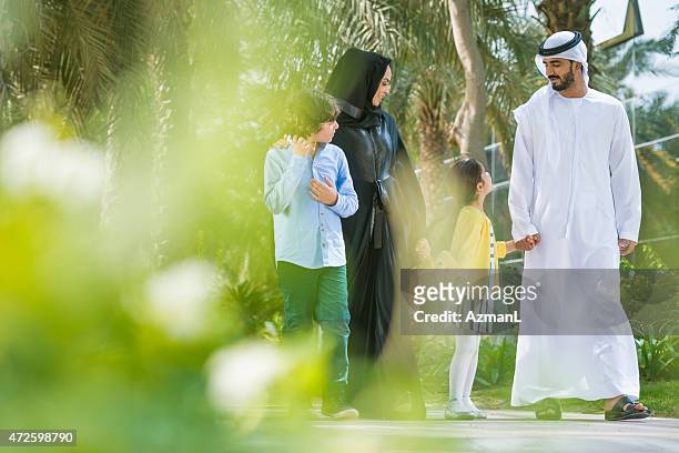 spending time together - arab family stockfoto's en -beelden