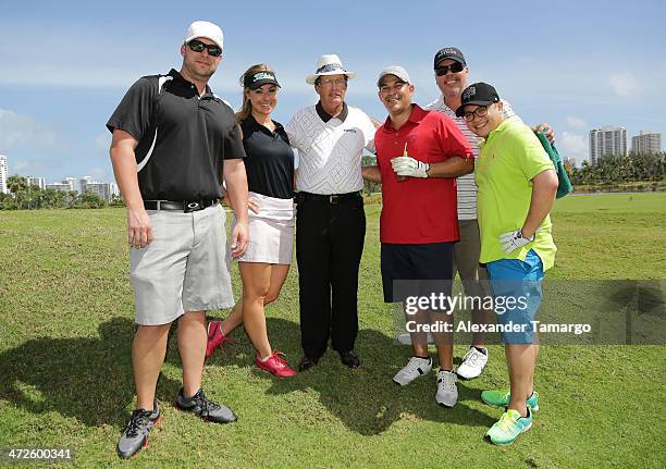 Chi Chi Rodriguez and Dale False pose with guests at the Personal Luxury Resorts & Hotels Presents Celebrity Chef Golf Tournament Hosted By Jose...