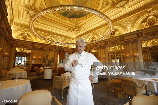 French chef Alain Ducasse poses in the "Louis XV" new dining restaurant in the Hotel de Paris, on May 8, 2015 in Monaco. AFP PHOTO / VALERY HACHE