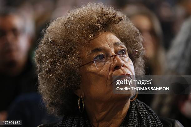 Political activist Angela Davis takes part in a meeting held in Saint-Denis, near Paris, to celebrate the 10th anniversary of anti-racism movement...