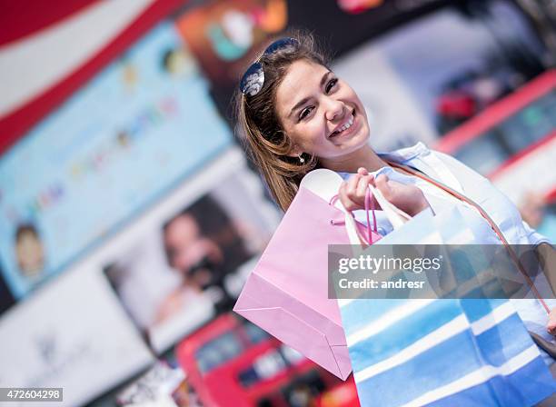 shopping woman in london - oxford street shopping stock pictures, royalty-free photos & images