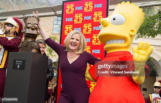 Actress Nancy Cartwright attends "The Simpsons" unveiling of Bart Simpson's "Bartman" character sculpture at USC School of Cinematic Arts on May 8,...