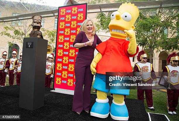 Actress Nancy Cartwright attends "The Simpsons" unveiling of Bart Simpson's "Bartman" character sculpture at USC School of Cinematic Arts on May 8,...