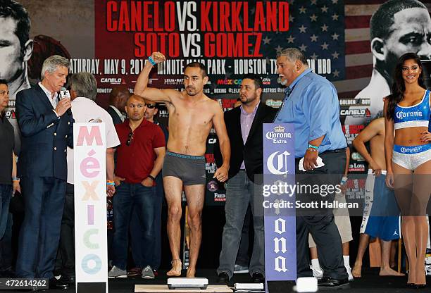 Humberto Soto of Mexico poses on stage inside the Union Station lobby during his weigh-in prior to his super lightweight bout with Frankie Gomez...