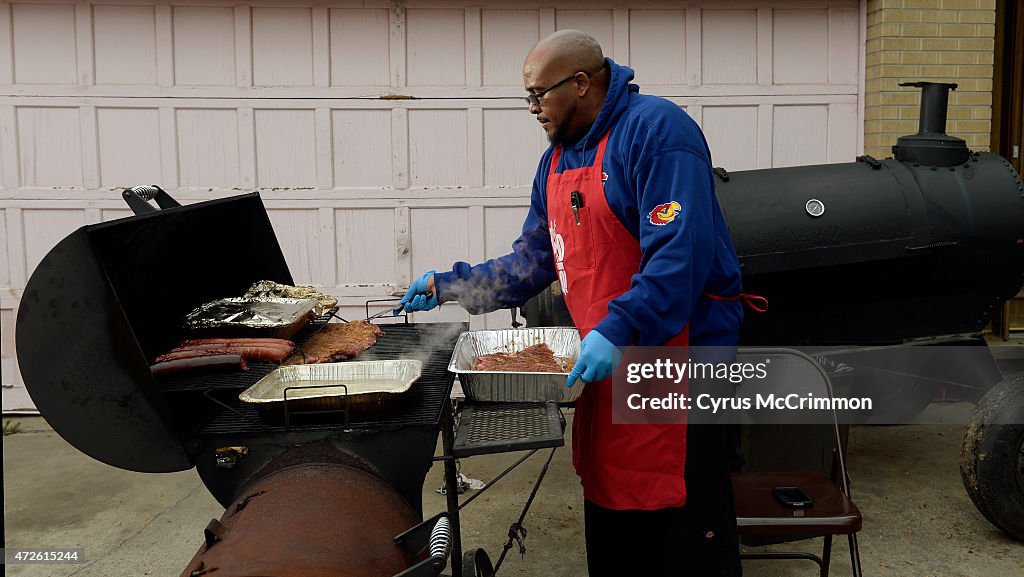 Barbeque master William Parson shows off tips to good grilling.