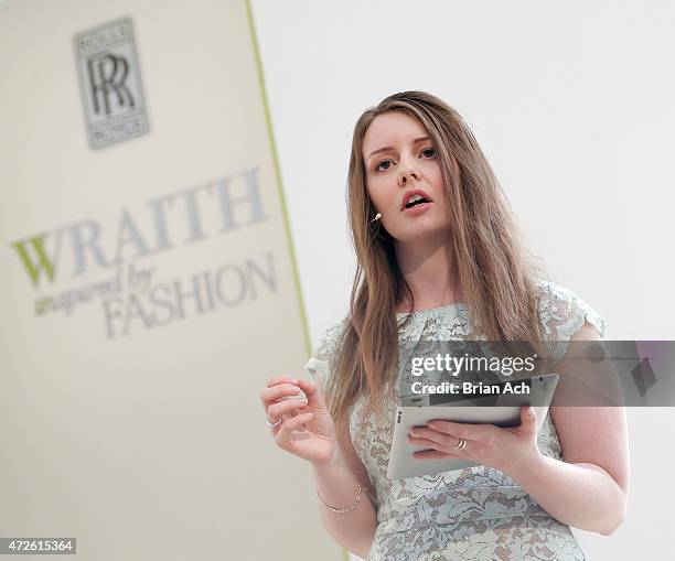 Rolls-Royce designer Michelle Lusby is seen addressing the crowd as Fashion Icon Olivia Palermo receives a first look at Rolls-Royce Motor Cars'...