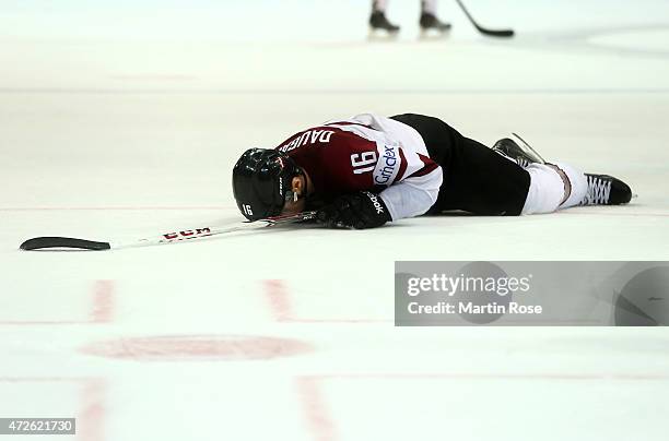 Kaspars Daugavins of Latvia looks dejected after the IIHF World Championship group A match between Czech Republic and Austria at o2 Arena on May 8,...
