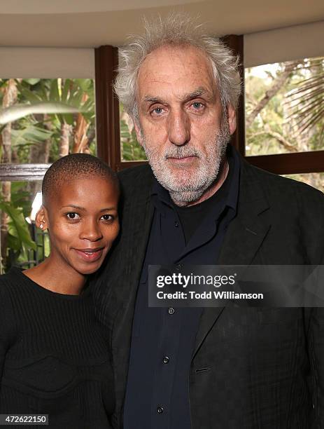 Phillip Noyce and wife Vuyo Dyasi attend A Luncheon In Celebration Of "I'll See You In My Dreams" at Sunset Tower Hotel on May 8, 2015 in West...