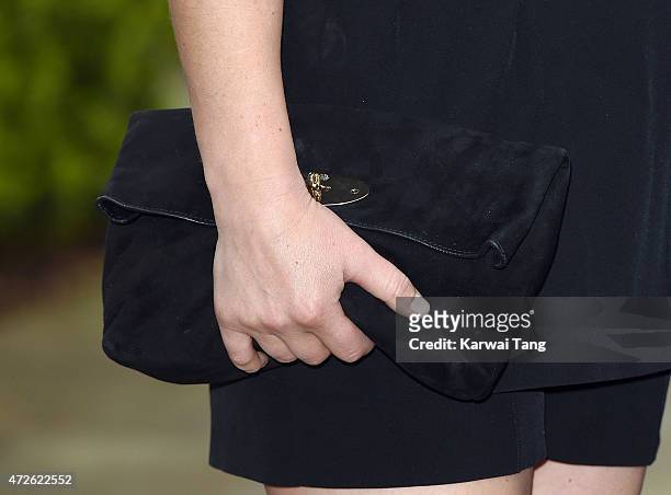 Zara Phillips, bag detail, attends an evening reception for the ISPS Handa Mike Tindall 3rd annual celebrity golf classic at The Grove Hotel on May...