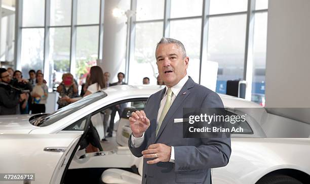 Gerry Spahn of Rolls-Royce is seen as Fashion Icon Olivia Palermo receives a first look at Rolls-Royce Motor Cars' latest design creation, Wraith...