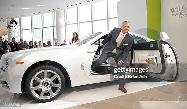 Gerry Spahn of Rolls-Royce is seen as Fashion Icon Olivia Palermo receives a first look at Rolls-Royce Motor Cars' latest design creation, Wraith...