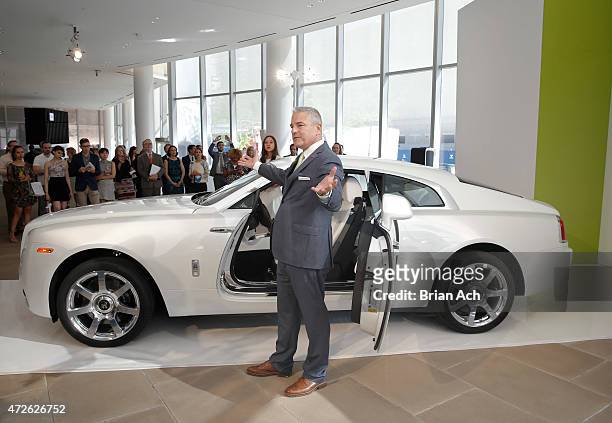 Gerry Spahn of Rolls-Royce is seen as Fashion Icon Olivia Palermo receives a first look at Rolls-Royce Motor Cars' latest design creation, Wraith...