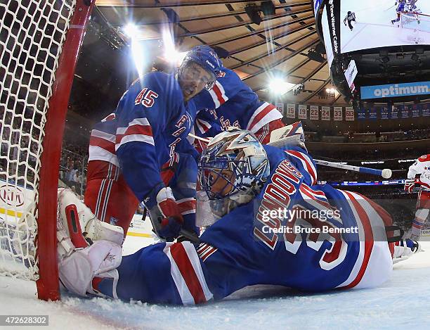 James Sheppard and Henrik Lundqvist of the New York Rangers defend the net against the Washington Capitals in Game Five of the Eastern Conference...