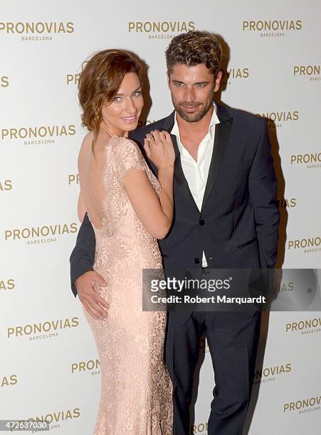 Raquel Jimenez and Pepo Marquez pose during a photocall for the latest collection by 'Pronovias' during Barcelona Bridal Week on May 8, 2015 in...