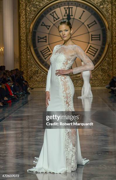 Model walks the runway for the latest collection by 'Pronovias' during Barcelona Bridal Week on May 8, 2015 in Barcelona, Spain.