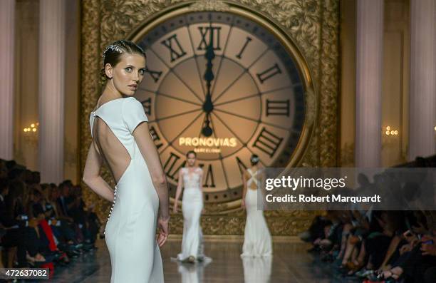 Model walks the runway for the latest collection by 'Pronovias' during Barcelona Bridal Week on May 8, 2015 in Barcelona, Spain.