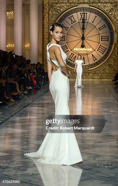 Model walks the runway for the latest collection by 'Pronovias' during Barcelona Bridal Week on May 8, 2015 in Barcelona, Spain.