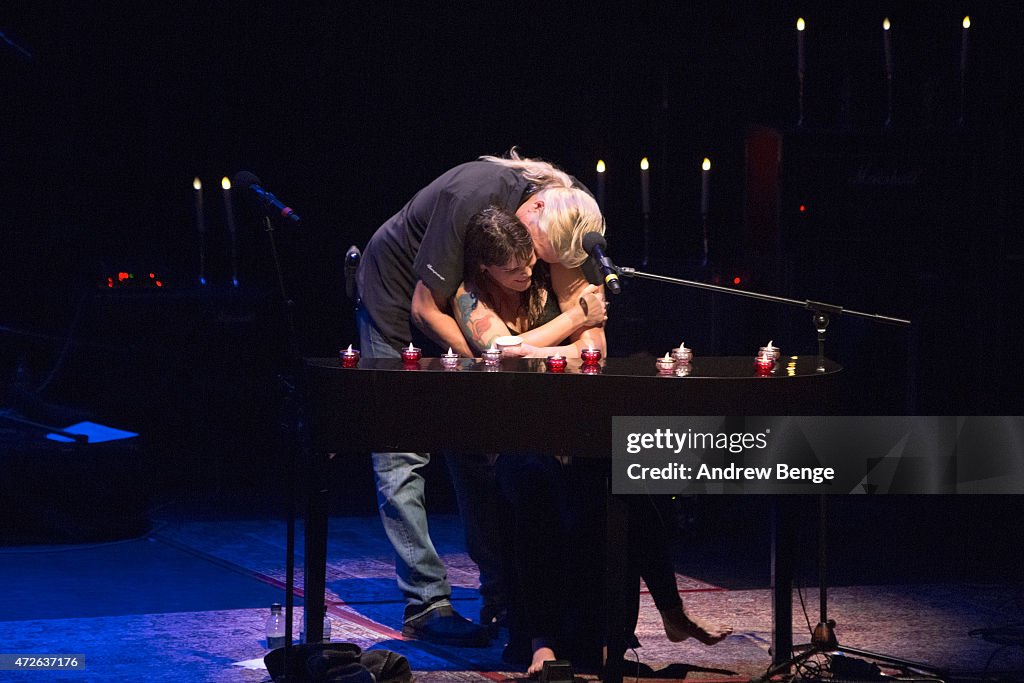 Beth Hart and Scott Guetzkow embrace on stage at Barbican Centre on