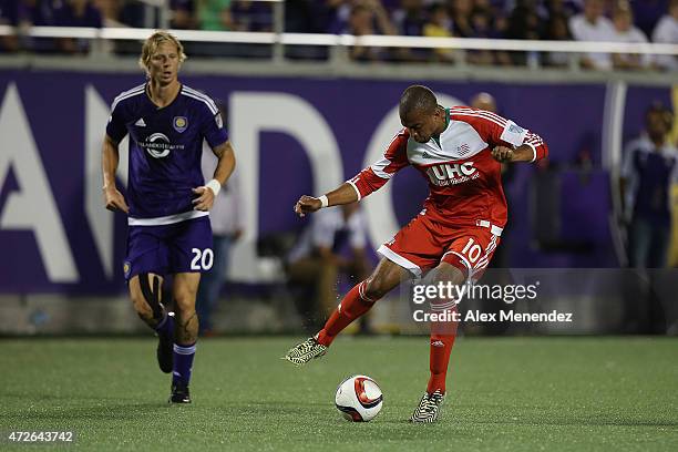 Teal Bunbury of New England Revolution dribbles the ball during an MLS soccer match between the New England Revolution and the Orlando City SC at the...