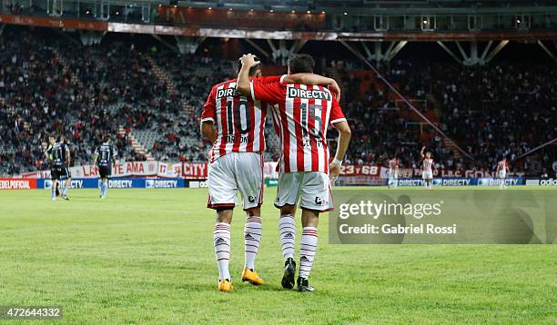 David Barbona of Estudiantes celebrates with Ezequiel Cerutti after scoring his team's first goal during a match between Estudiantes and Temperley as...