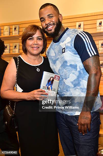 Carmen Surillo and Rapper The Game attend the La La Anthony " The Power Playbook" book signing at Barnes & Noble on May 8, 2015 in Atlanta, Georgia.