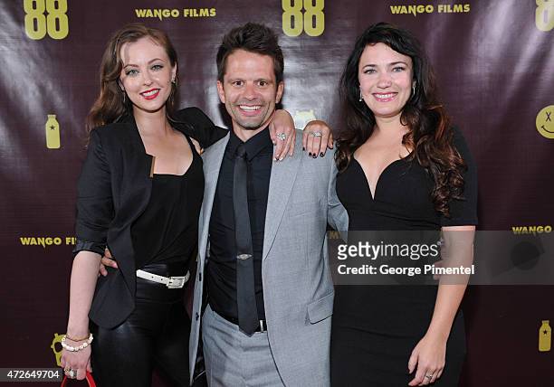 Actress Katharine Isabelle, Writer, Producer, Actor Tim Doiron and Director, Producer, Actress April Mullen attend the "88" Canadian premiere at...