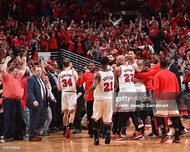 Derrick Rose of the Chicago Bulls reacts after hitting the game winning three pointer with three seconds left in the game against the Cleveland...