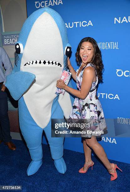 Actress Jenna Ushkowitz and Left Shark from the 2015 Super Bowl Katy Perry halftime show arrive at the 3rd Annual Nautica Oceana Beach House Party at...