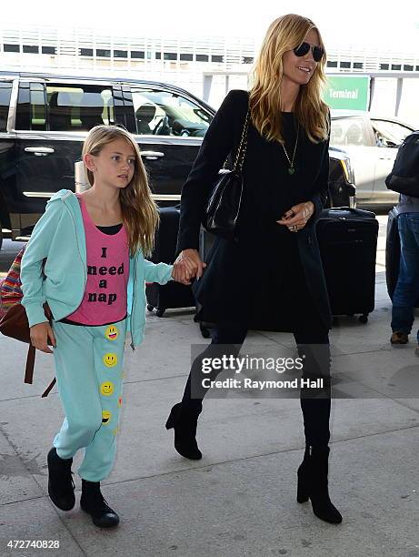 Model Heidi Klum and daughter Leni Samuel are seen at JFK on May 8, 2015 in New York City.