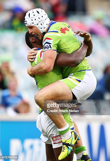 Edrick Lee and Jarred Croker of Raiders celebrate a try by Edrick Lee during the round nine NRL match between the Canberra Raiders and the GOld Coast...