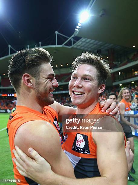 Stephen Coniglio and Toby Greene of the Giants celebrate victory after the round six AFL match between the Greater Western Giants and the Hawthorn...
