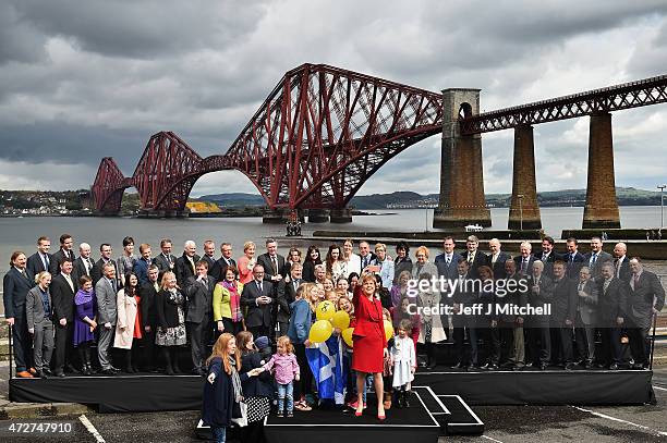 First Minister and leader of the SNP Nicola Sturgeon is joined by the newly elected members of parliament as they gather in front of the Forth Rail...