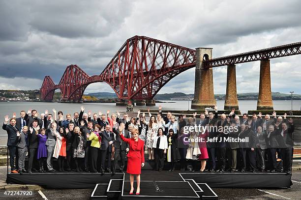 First Minister and leader of the SNP Nicola Sturgeon is joined by the newly elected members of parliament as they gather in front of the Forth Rail...