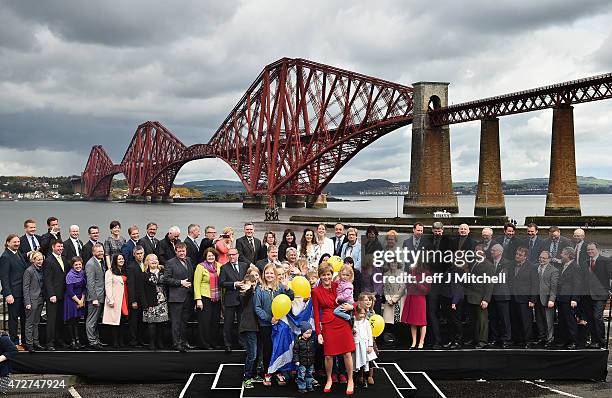 First Minister and leader of the SNP Nicola Sturgeon is joined by the newly elected members of parliament as they gather in front of the Forth Rail...