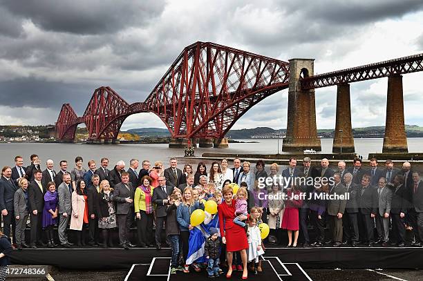 First Minister and leader of the SNP Nicola Sturgeon is joined by the newly elected members of parliament as they gather in front of the Forth Rail...